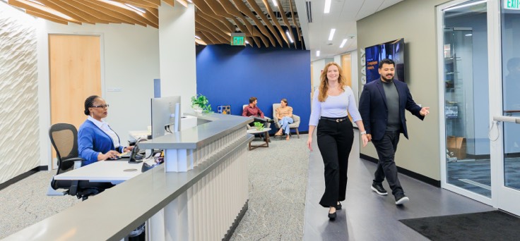 Employees working inside of Merrick's Denver office
