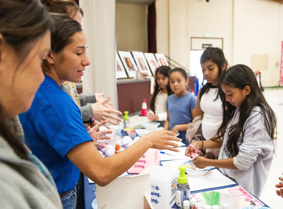 volunteers working a STEM engagement program